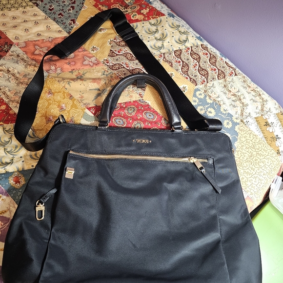 Tumi Handbags - TUMI cross body laptop bag
